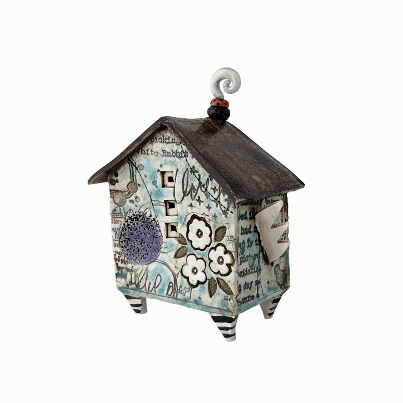 Handmade porcelain house by ceramic artist Barbara Chadwick, botanical and butterfly details. Back view.