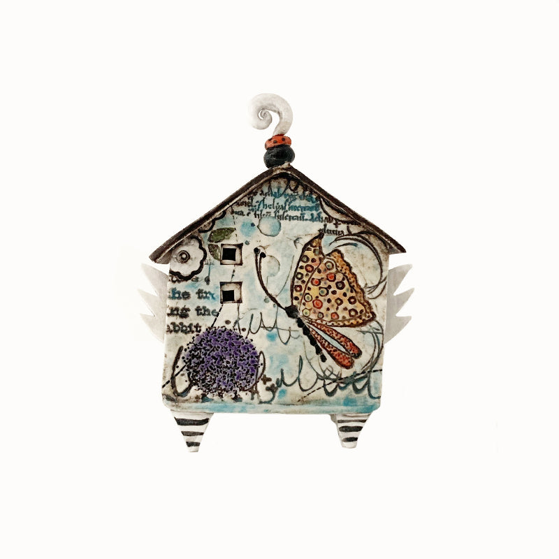 Handmade porcelain house by ceramic artist Barbara Chadwick, botanical and butterfly details.