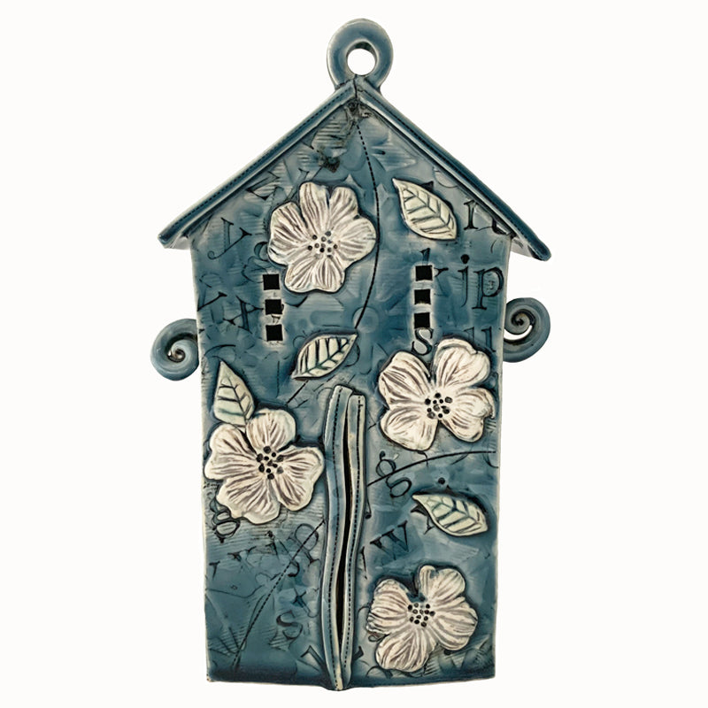 Handmade ceramic house by artist Barbara Chadwick, blue with white dogwood flowers, letter and number details.