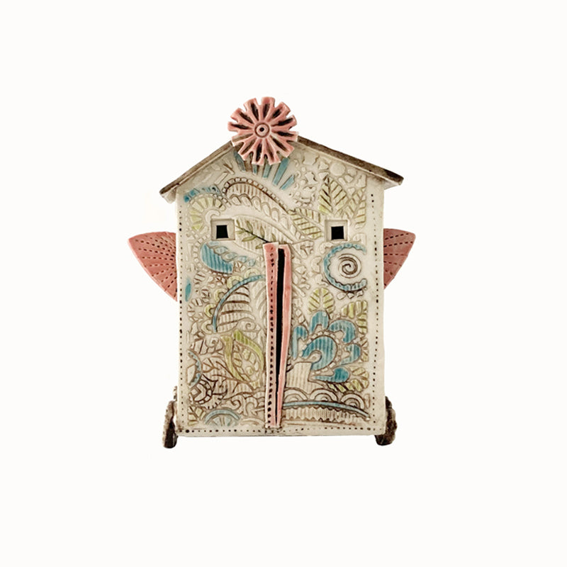 Handmade porcelain house by ceramic artist Barbara Chadwick, botanical details and bird.