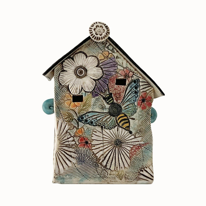 Handmade porcelain house by ceramic artist Barbara Chadwick, flower and insect details.