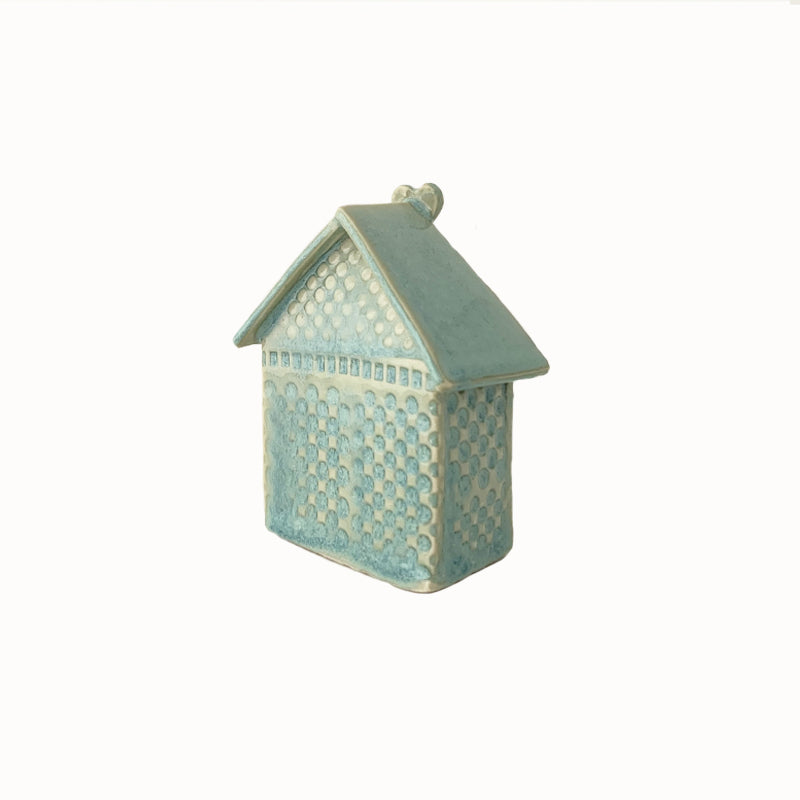 Handmade porcelain house by ceramic artist Barbara Chadwick, seafoam with dots and hearts. Back view.
