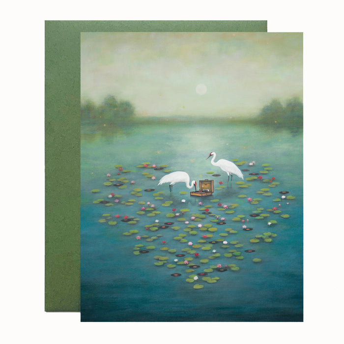 Duy Huynh notecard "Nocturntable (Portable Place of Rufuge). Two cans and a record player are surrounded in the water by a heart shape consisting of records and lotus flowers. Card is blank inside.