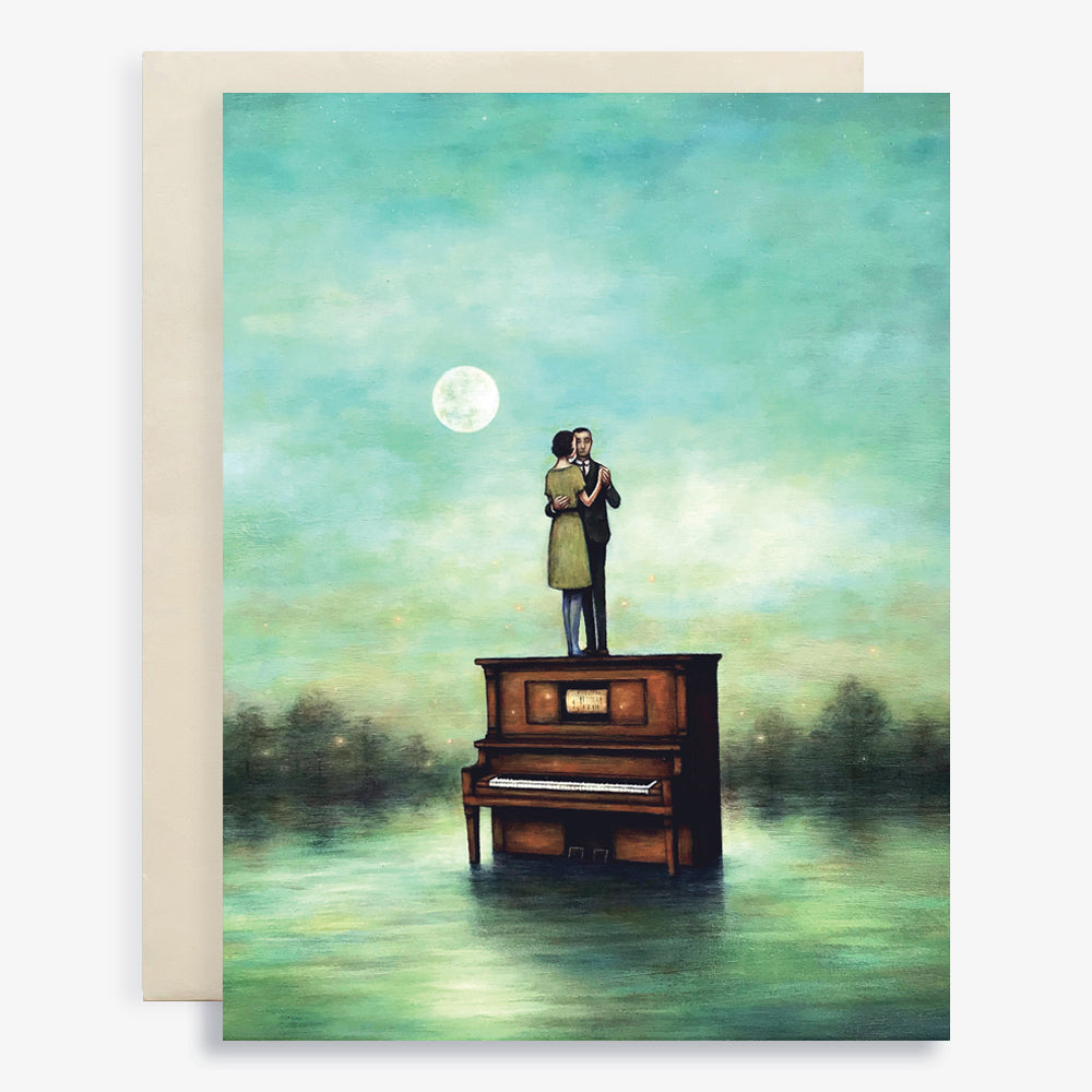 Duy Huynh notecard "Dance the Blues". A couple dances under the moonlight, on top of a piano that sits in the water. Card is blank inside.