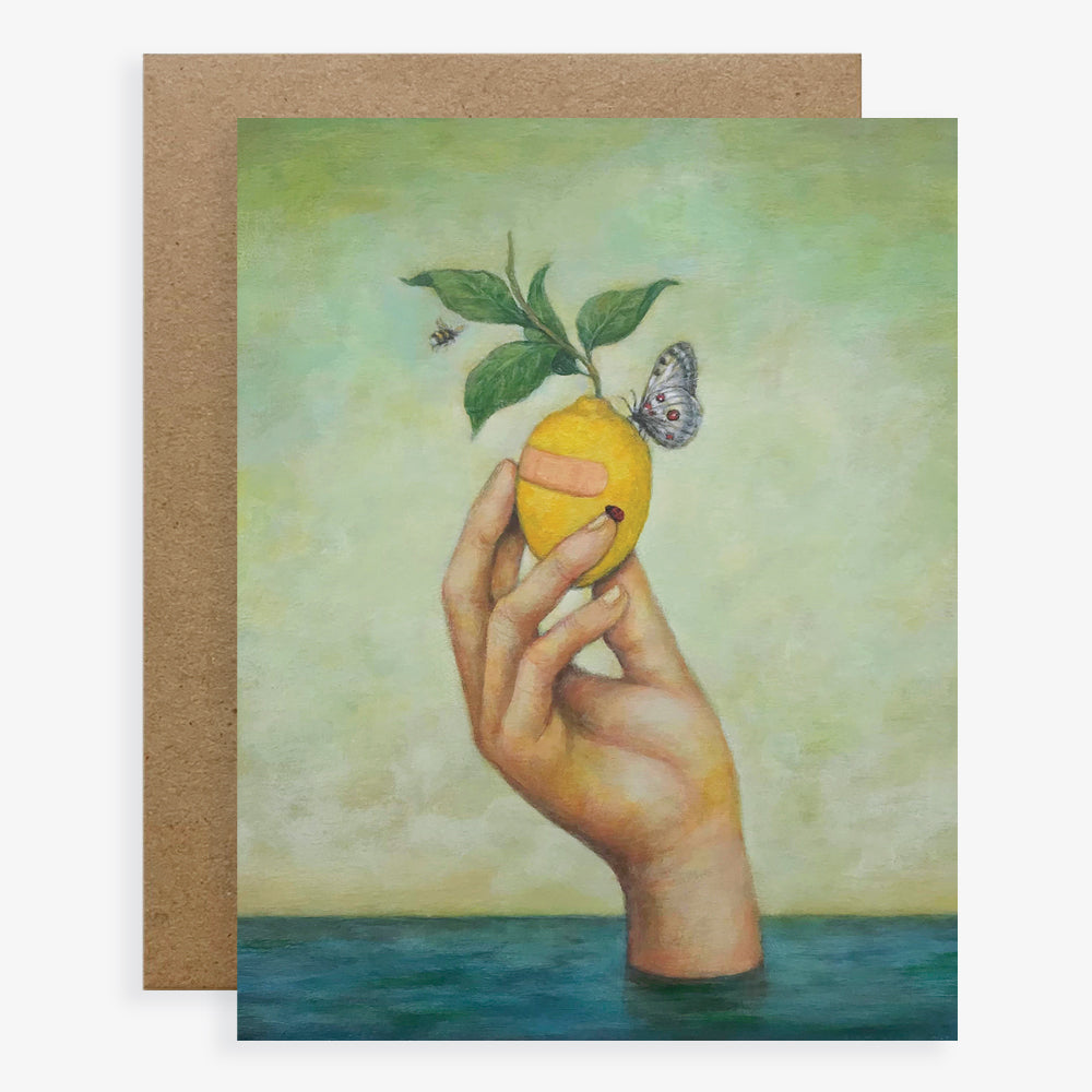 Duy Huynh notecard "Lemon Aid". A hand emerges from the water holding a lemon. The lemon has a band aid on it, and is accompanied by a ladybug, butterfly and bee. Card is blank inside.