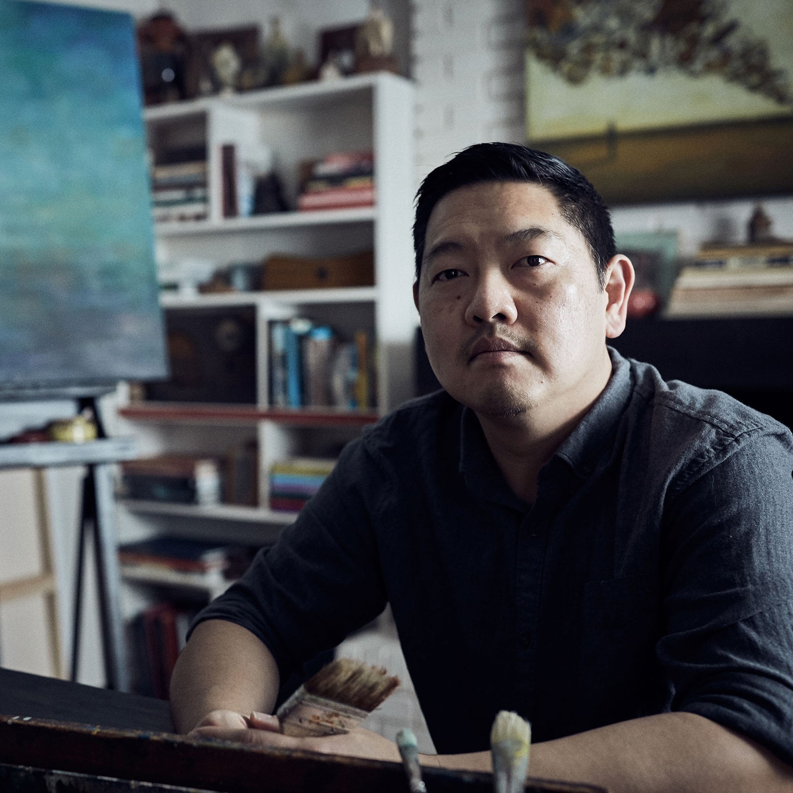 Charlotte NC based artist, and Lark + Key co-owner, Duy Huynh in his studio.