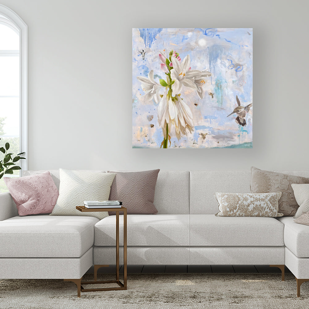 Eleanor Miller's "Morning Star" 40 x 40" oil painting, with large white lilies, hummingbirds and bees. Shown hanging over a sofa.