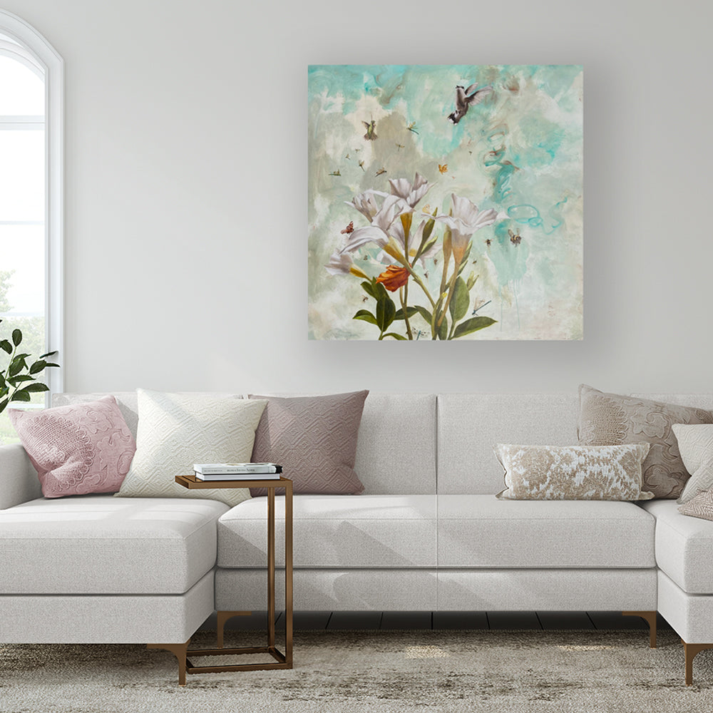 Eleanor Miller's "Summer Dance" 40 x 40" oil painting, with white flowers, hummingbirds and various insects. Shown hanging over a sofa.