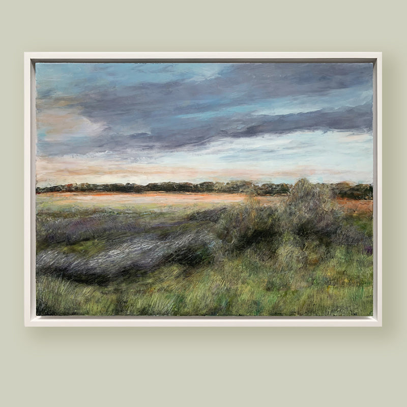 "Layers of Life" oil and cold wax painting by Charlotte NC based artist Elizabeth Davant. 12 x 16" marsh landscape, set in a white floater frame. Shown on pale, muted green wall.