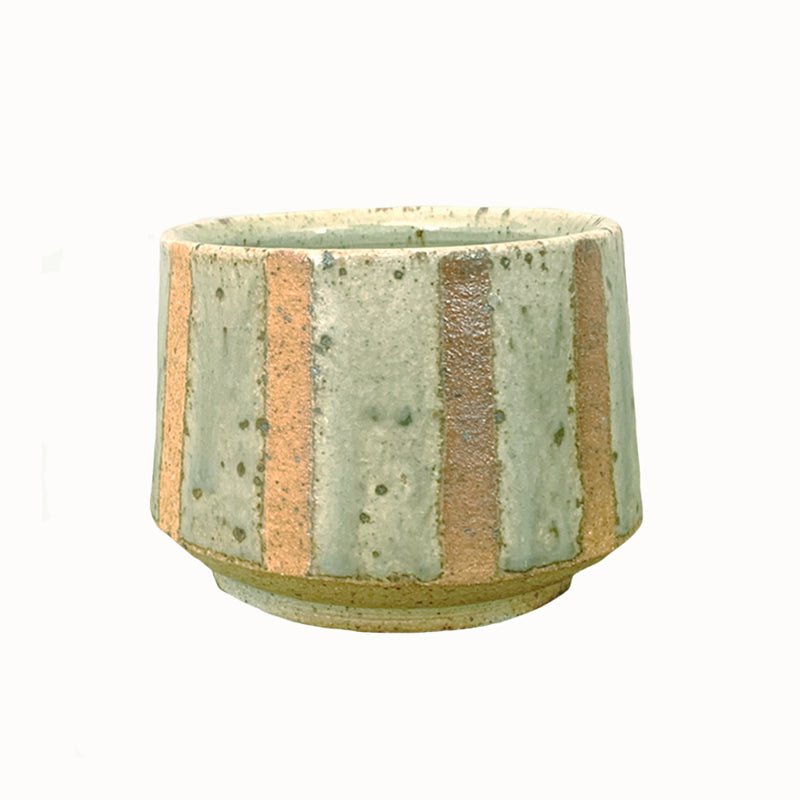 Heather Ossandon handmade, woodfired mug, angled view. Light green with rusty stripes. Front view.