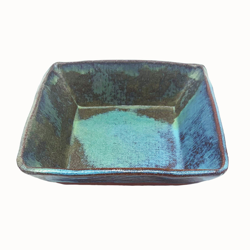 Small, multicolor square bowl by potter Jim Rientjes. Earthy tones and vibrant blues.