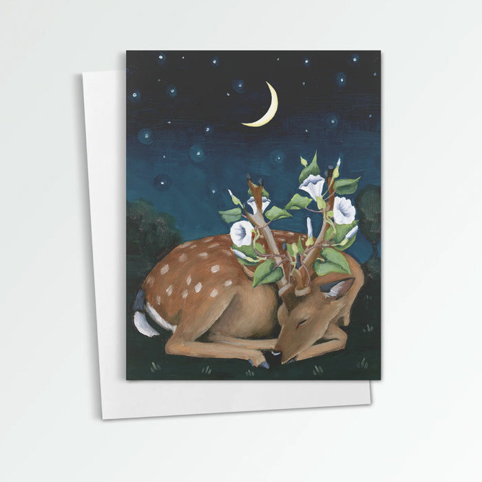 Deer with Moonflowers notecard from Kim Ferreira. A deer sleeps under a night sky, moonflowers entwined around its antlers.