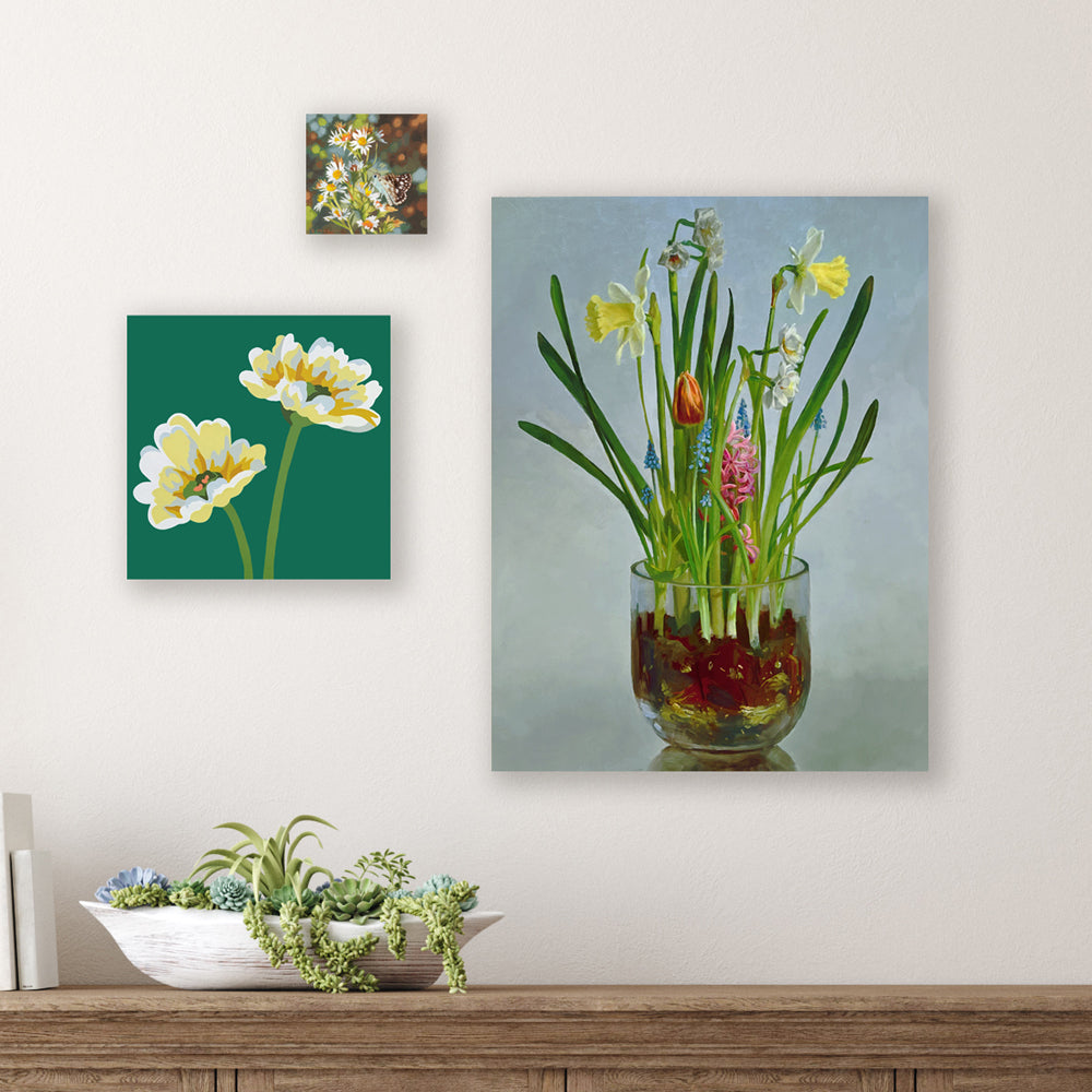 Three flower themed paintings by Sarah Moore, Michele Aschenbrenner and Wendy Rouse for the Wallflower exhibit at Lark & Key.