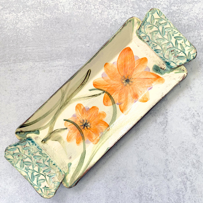 Handmade ceramic tray with orange flowers by Molly Lithgo. Made in North Carolina.