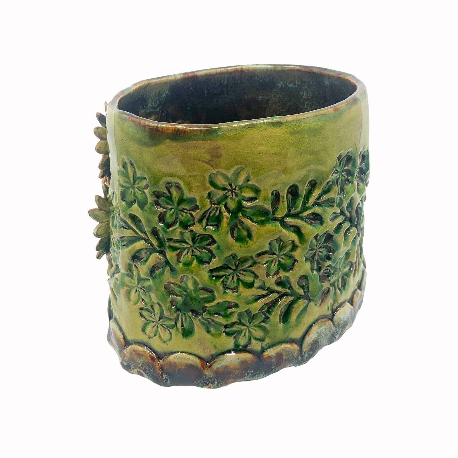 Green oval shaped ceramic vessel with stamped flower pattern and pink flowers by artist Paula Smith. Perfect on its own or used for various purposes - showcase fresh or dried flowers, store kitchen utensils, serving dish, hold mail, etc. Back view shown.