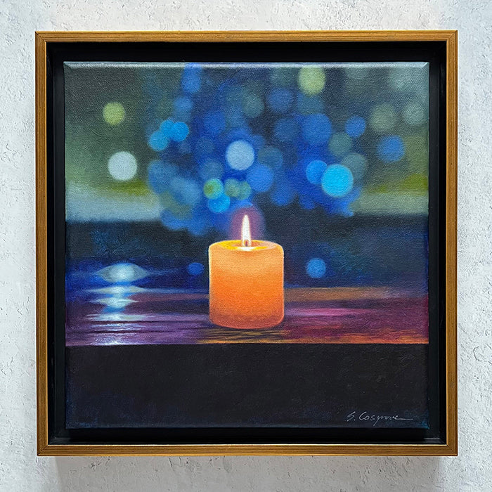 Framed painting by Sharon Cosgrove of a lit candle with a colorful blurred background in blues and greens. Artwork displayed on wall. 