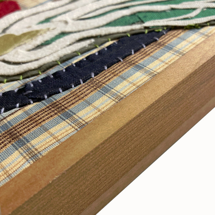 Bok Chow, Tomatoes textile collage by artist Hannah Goff. The artwork is comprised of hand-sewn, reclaimed and recycled fabrics, and features tomatoes on the vine and a bok choy. Finished in a handmade rustic wood frame, detail shown.