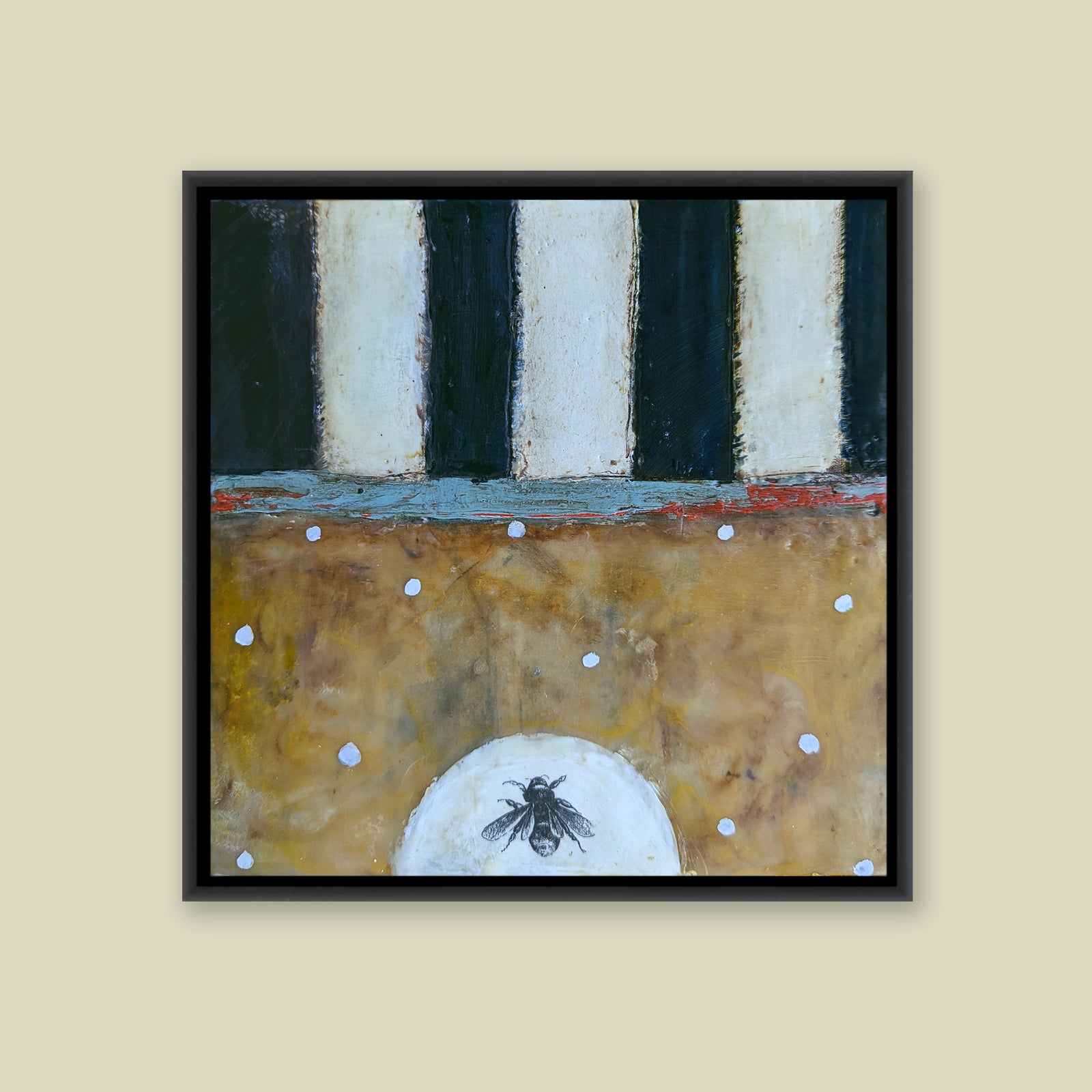 "Never Alone", mixed media encaustic painting by Bridgette Guerzon Mills. A small bee image sits at the bottom of the painting, golden hues with white polka dots then black and white strips fill the remaining space.