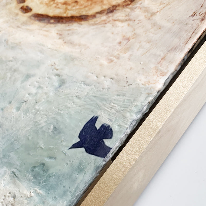 "Seeking Out an Anchor" painting by Bridgette Guerzon Mills.  Framed  mixed media encaustic artwork with abstract design, tree silhouette, and bird in flight.  Frame detail shown.