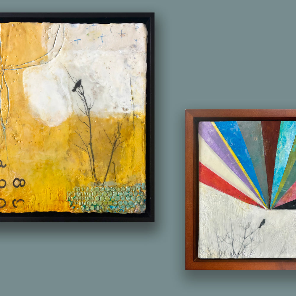 Two framed paintings on gray wall, colorful works with bird and tree details.