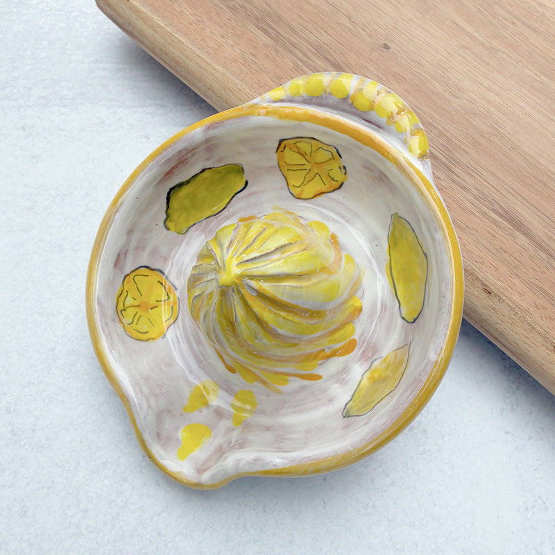 Handmade ceramic juicer with lemon decoration by Molly Lithgo.