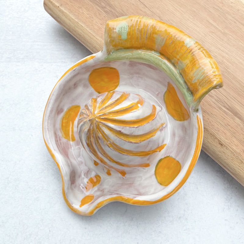 Handmade ceramic juicer with orange decoration by Molly Lithgo.