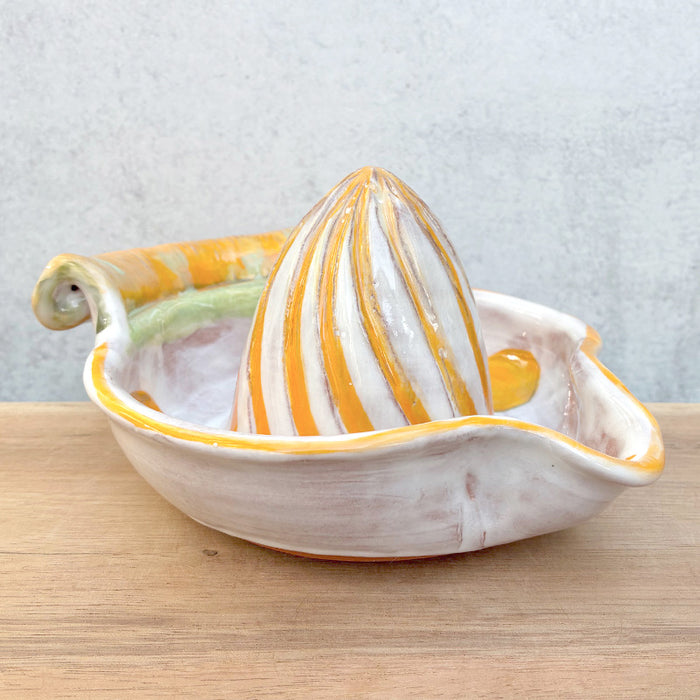 Handmade ceramic juicer with orange decoration by Molly Lithgo.