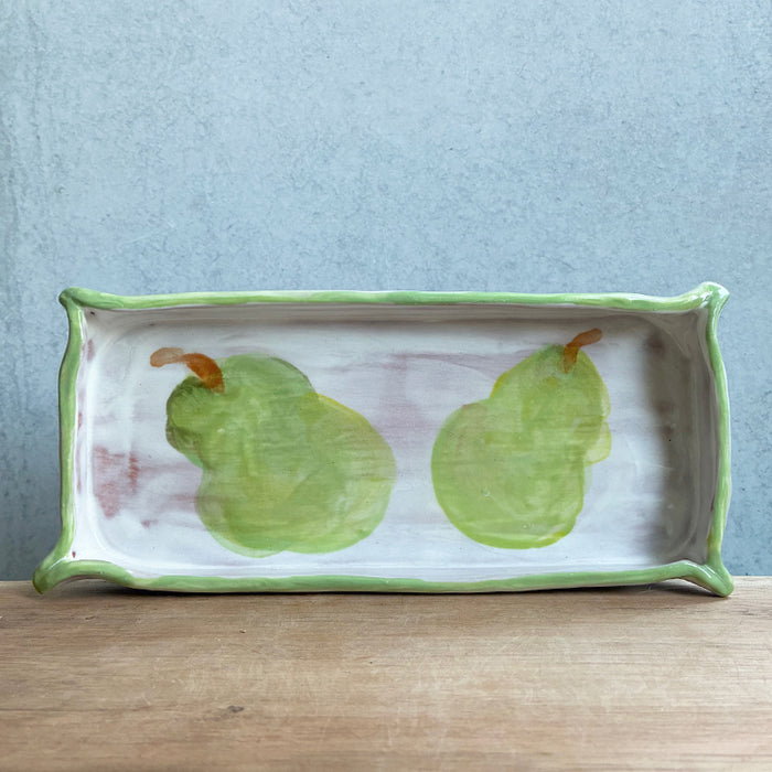 Ceramic pear salt and pepper shaker set with rectangle tray by Molly Lithgo. Tray, decorated with two pears, shown. 