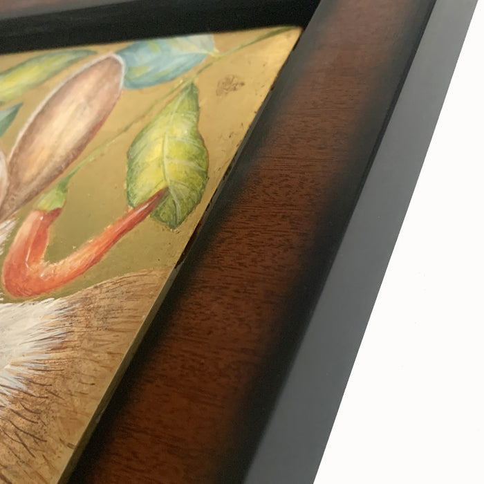 Garden Interloper painting by Diane Savino, a rabbit is surrounded by foliage and red peppers. Set in a brown and black frame, shown on a light blue wall. Frame detail shown.