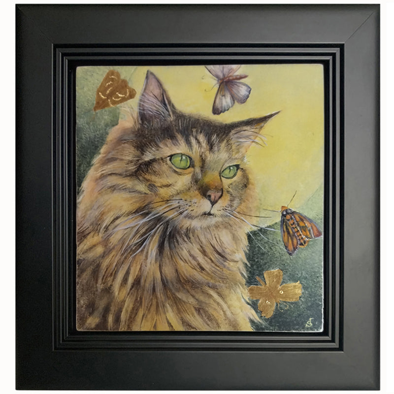 Under the Hunter Moon painting by Diane Savino, a cat sits under a golden moon and is surrounded by moths.