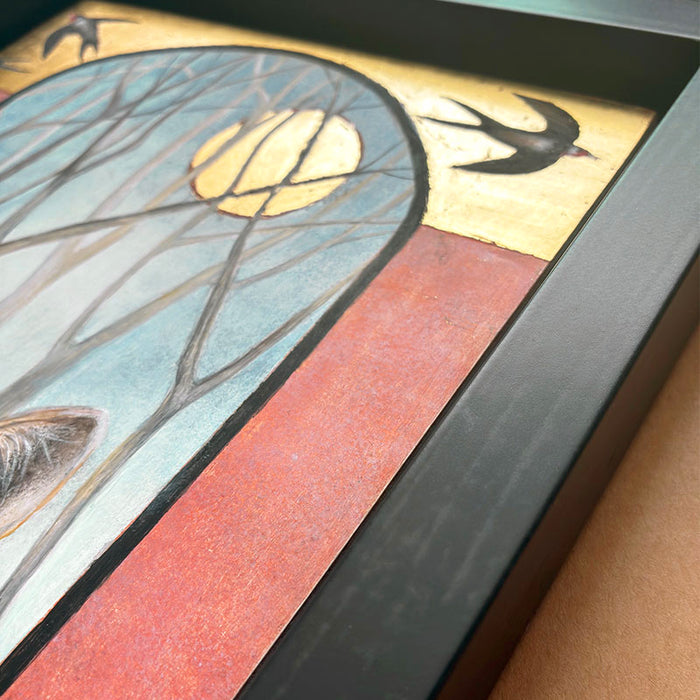 Illustrative egg tempera and gold leaf painting featuring a gray wolf in the foreground, an arched window-like scene with bare trees and a golden moon, two birds at the top, and red-orange side panels. The artwork, by Diane Savino, is set in a dark brown frame. Detail shown.