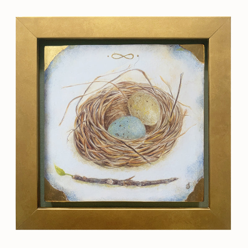 "With Promises to Keep" painting by Diane Savino. A nest holds one blue egg and one yellow egg, a small branch with a single green leaf below it. The artwork has a gold frame.