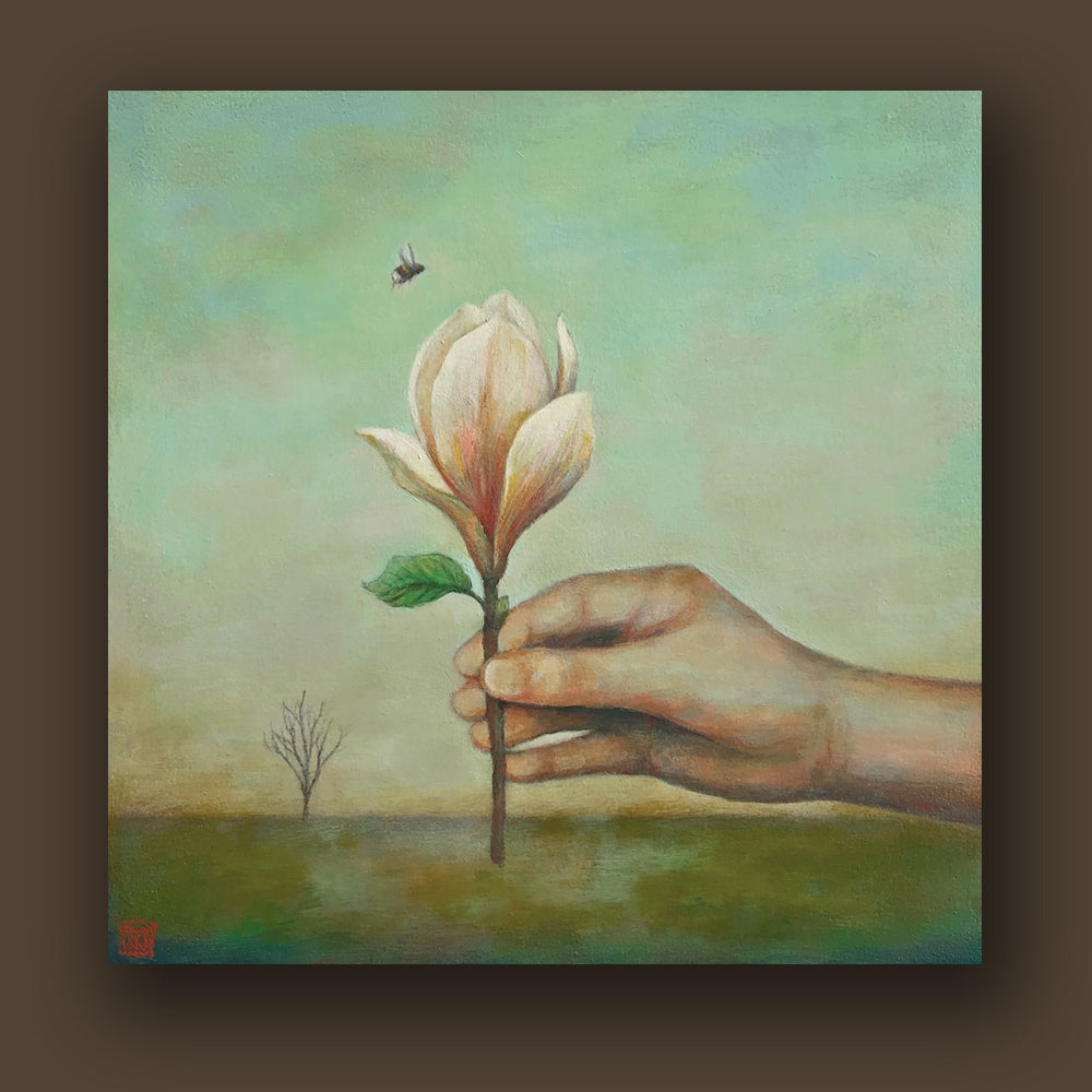 "Opportunity for Growth" painting by artist Duy Huynh. A hand holds a sensation magnolia flower with a single bee buzzing above. An open landscape with one leafless tree sits in the background. 12 x 12 x 2" acrylic on wood. The painting is shown on a brown wall.