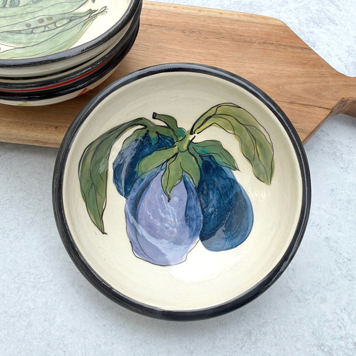 Handmade ceramic bowl with eggplant decoration by Molly Lithgo.