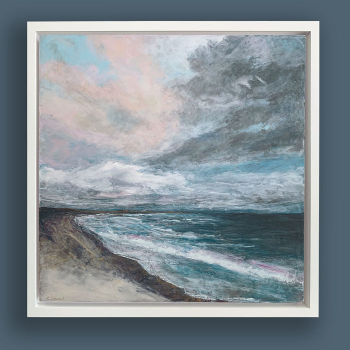 Oil and cold wax painting of a cloudy coastal view off Smith Island by Charlotte NC artist Elizabeth Davant, at Lark & Key. Framed in white and shown on dark blue wall.