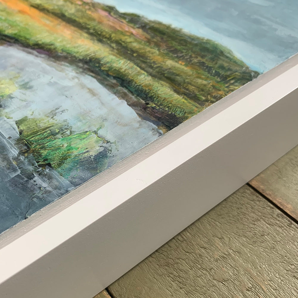 "Orange Dusk" oil and cold wax painting by Charlotte NC based artist Elizabeth Davant. 12 x 12" marsh landscape, set in a white floater frame. Frame detail shown.