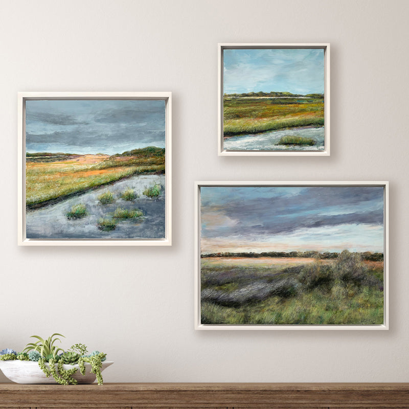 Three oil and cold wax paintings by Charlotte NC based artist Elizabeth Davant. Marsh landscapes, set in a white floater frames - shown grouped together on the wall.