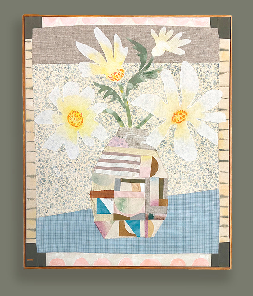 Patchwork Daisies by Hannah Goff, mixed media textile artwork with patchwork vase filled with white  and yellow daisies. Displayed on dark green wall. 