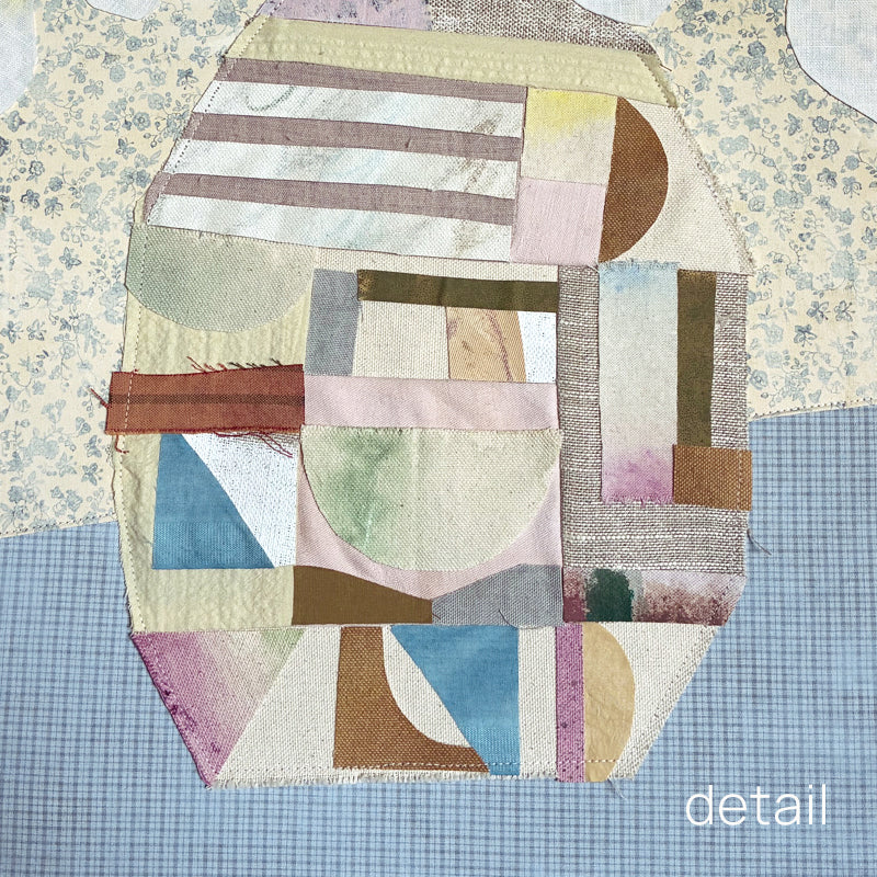 Patchwork Daisies by Hannah Goff, mixed media textile artwork with patchwork vase and white daisies. Close up vase detail.