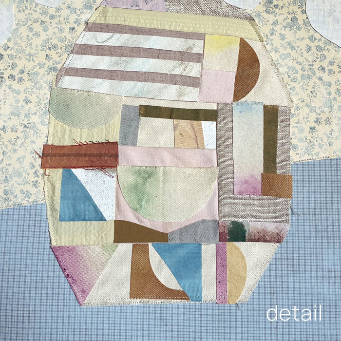 Patchwork Daisies by Hannah Goff, mixed media textile artwork with patchwork vase and white daisies. Close up vase detail.