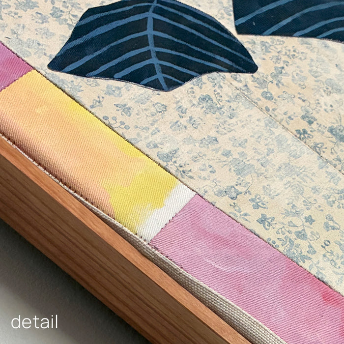 Multi Patchwork Vase artwork by Hannah Goff, colorful, contemporary quilted mixed media vase with abstracted flowers and wood frame. Up close frame detail.