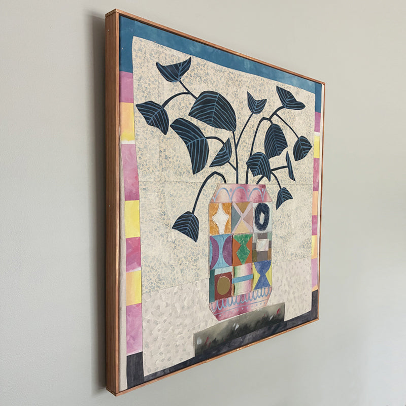 Multi Patchwork Vase artwork by Hannah Goff, colorful, contemporary quilted mixed media vase with abstracted flowers and wood frame. Displayed over table. Side view on wall. 