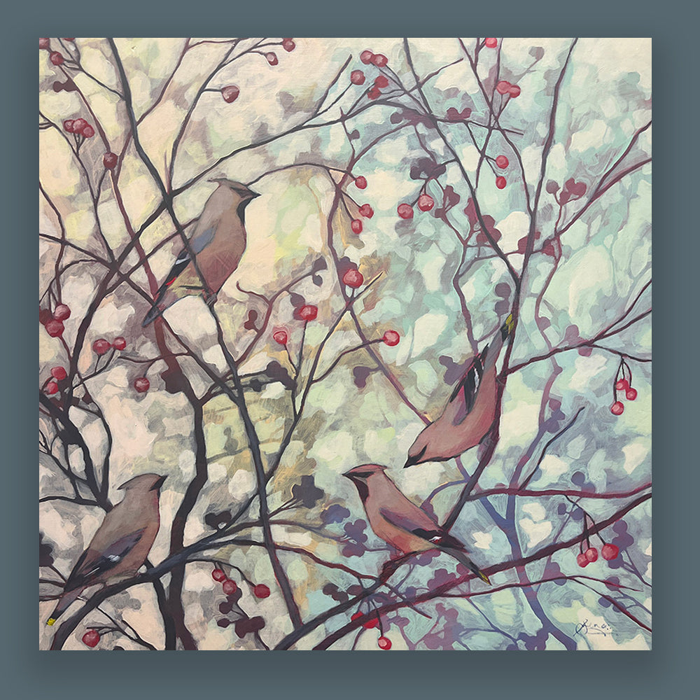 Hannah Seng's Cedar Waxwings painting, four cedar waxwing birds perched on branches with soft foliage and red berries. Shown on dark blue wall.