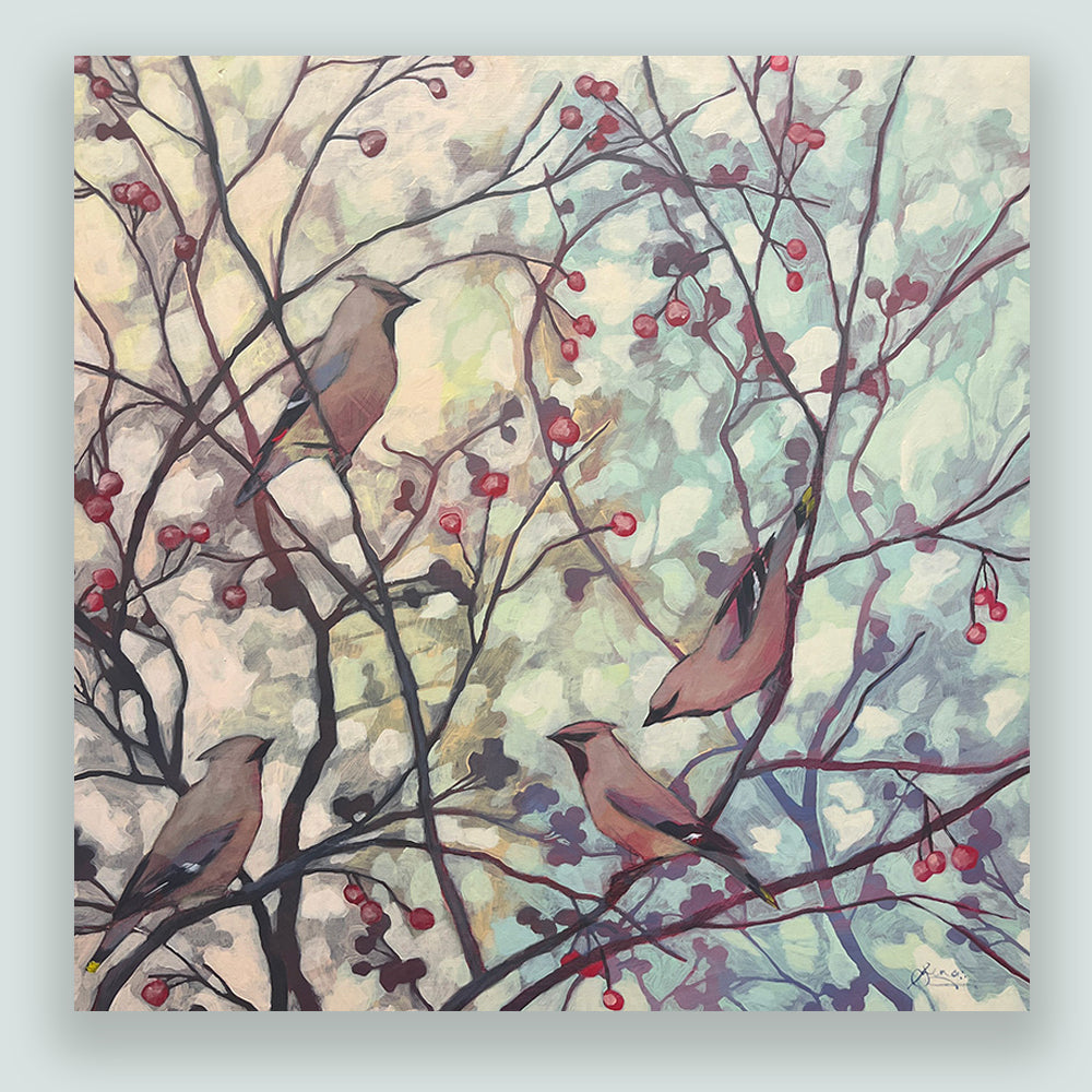Hannah Seng's Cedar Waxwings painting, four cedar waxwing birds perched on branches with soft foliage and red berries. Shown on pale blue wall.