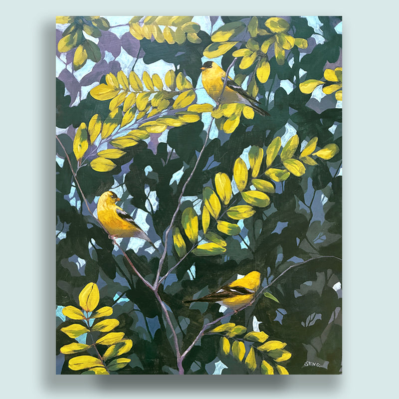 Acrylic painting by Hannah Seng, featuring three goldfinch birds perched among locust tree branches with yellow and green foliage. Displayed on pale blue wall. 