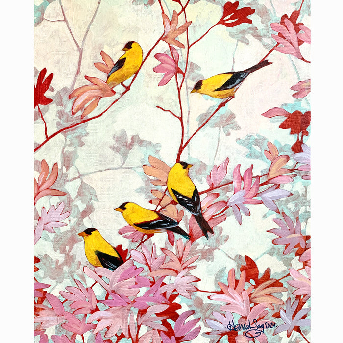 Goldfinches in the Magnolia
