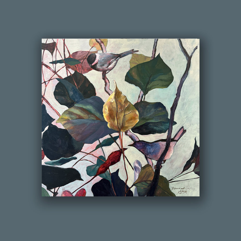 Hannah Seng's "Leaves of Birdsong" painting, a black capped chickadee and Carolina wren among fall foliage.  Shown on dark blue wall.