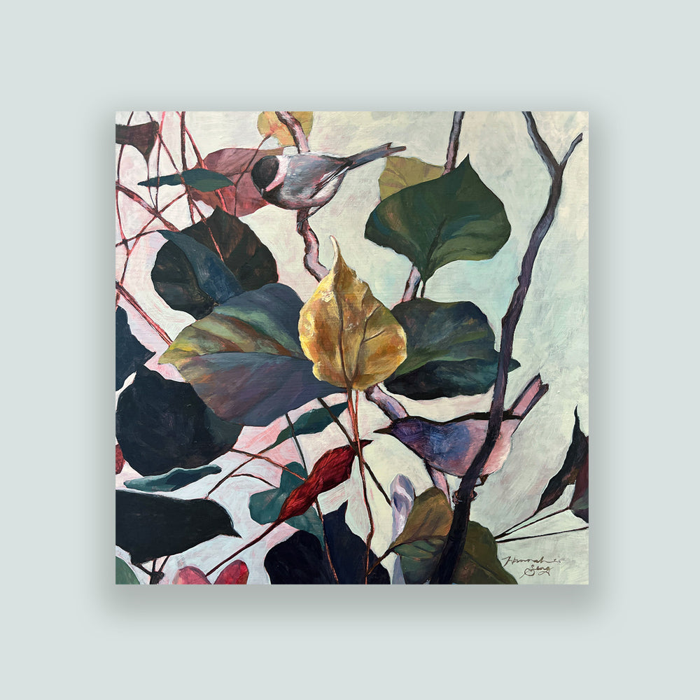 Hannah Seng's "Leaves of Birdsong" painting, a black capped chickadee and Carolina wren among fall foliage. Shown on pale blue wall.