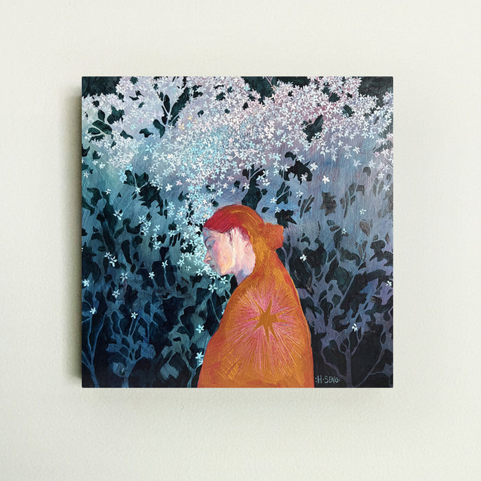 Night Blooms painting on white wall by Hannah Seng. Female figure wearing an orange garment with starburst detail, floral background in blues and purples.