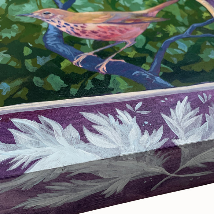 "The Wood Song" by Hannah Seng with wood thrush, tree and botanical details. Side detail.